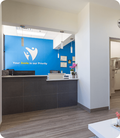 couple smiling together while looking at financial options in Portland